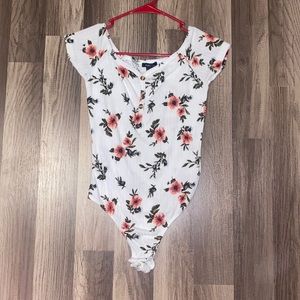 Rue21 bodysuit, floral, size small for sale.